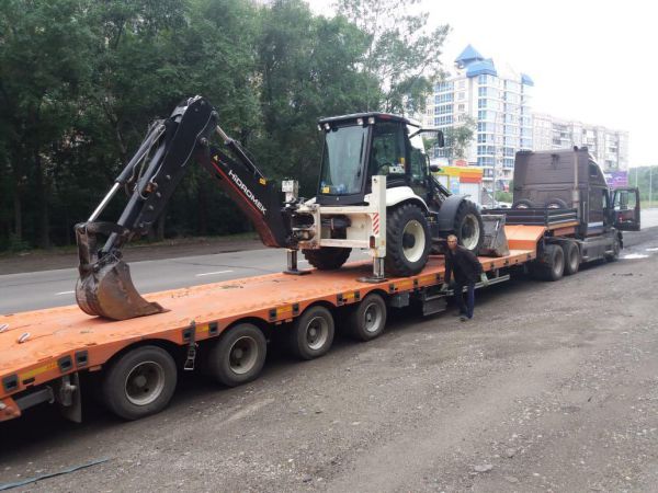 JCB перевозка на трале